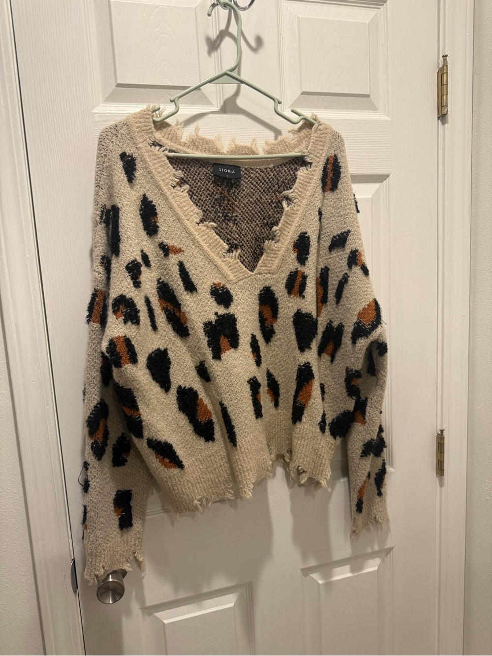 Storia Cream Leopard V-Neck Distressed Sweater with Black & Brown Spots